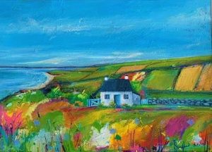 Old welsh cottage set in fields above the coast