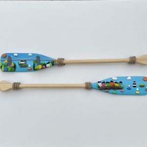 pebble art of Beaumaris, and the Menai suspension bridge set on a pair of oars by anglesey artist deborah kempton