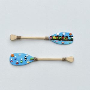 pebble art of beaumaris' colourful houses and pier, sail boats and lighthouse by Anglesey artist deborah kempton