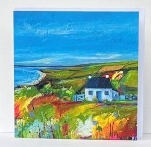 art card of a cottage set in landscape by the sea by anglesey artist deborah kempton