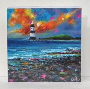 contemporary greeting card of the lighthouse at penmon with a colourful orange clouded sky by anglesey artist www.deborahkempton.co.uk