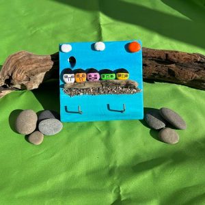 hand painted pebble art colourful houses keyring holder
